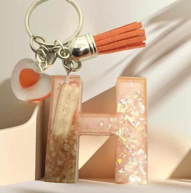 Porte-clés lettre H en résine
